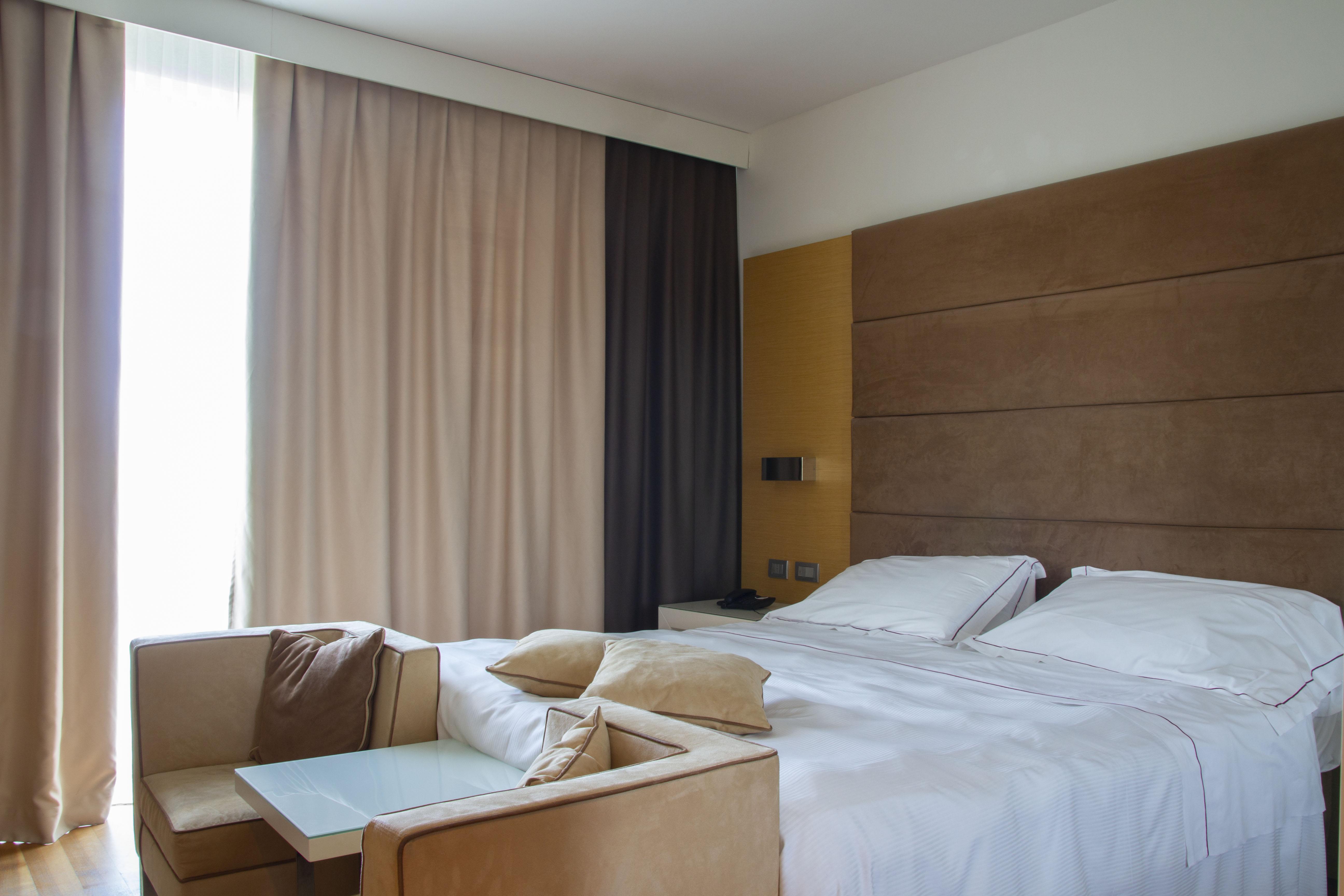 أبيتاليا تاور بلازا بيزا المظهر الخارجي الصورة A bedroom