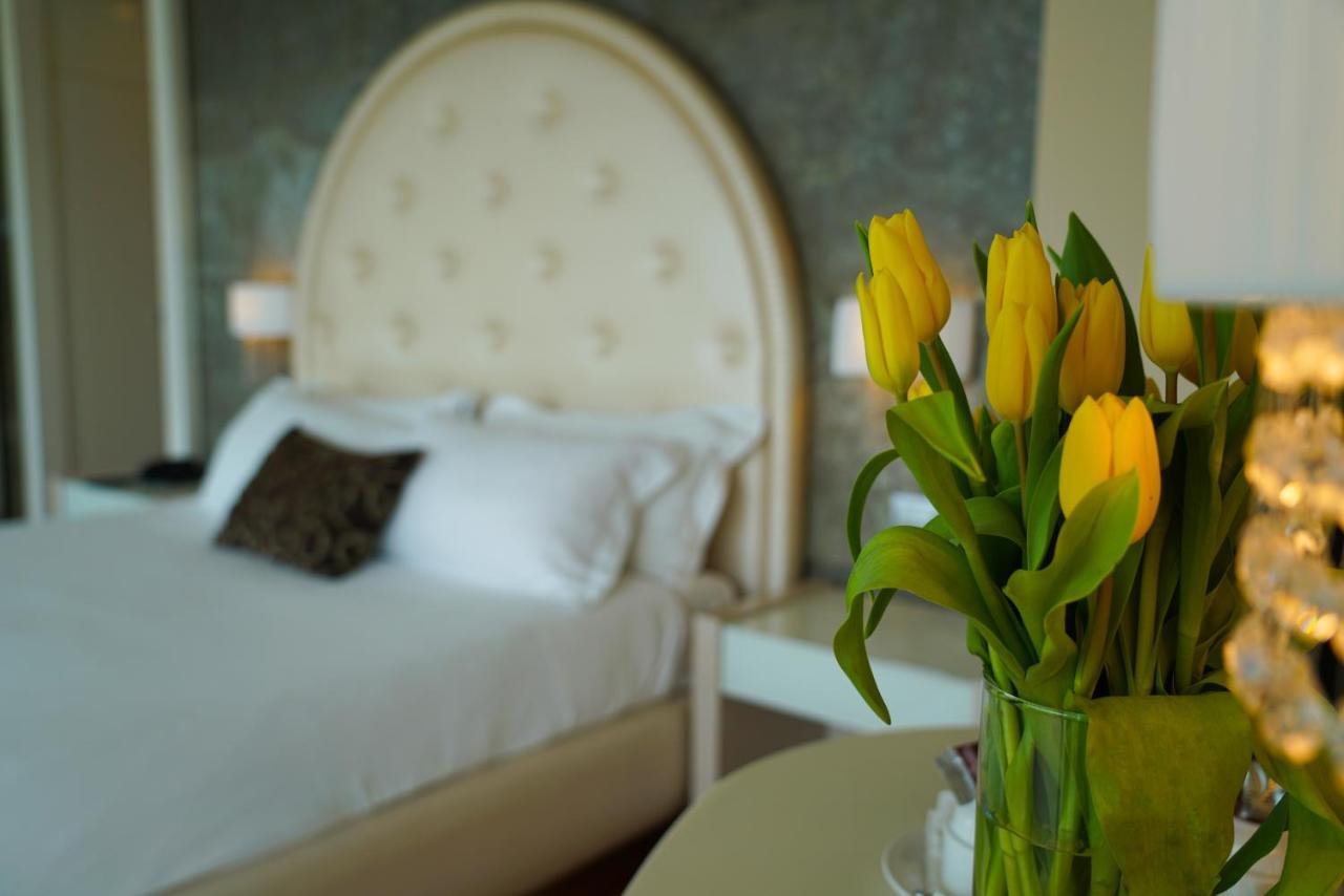 أبيتاليا تاور بلازا بيزا المظهر الخارجي الصورة A bedroom at the hotel